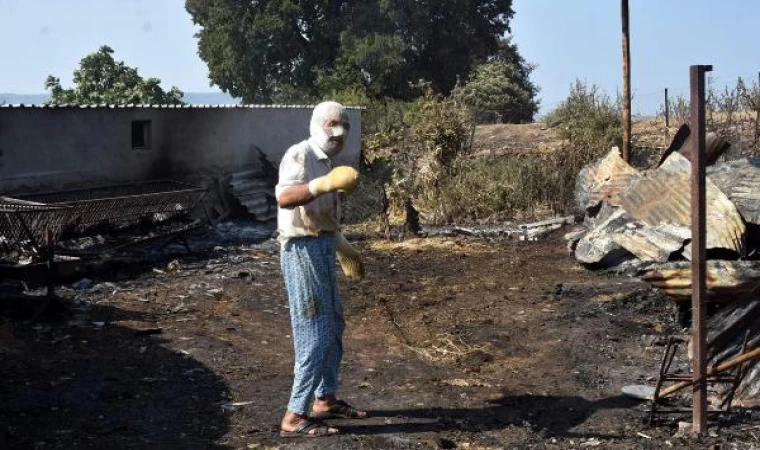 Alevlerin sardığı ahırdan hayvanların kurtarmak isterken ölümden döndü