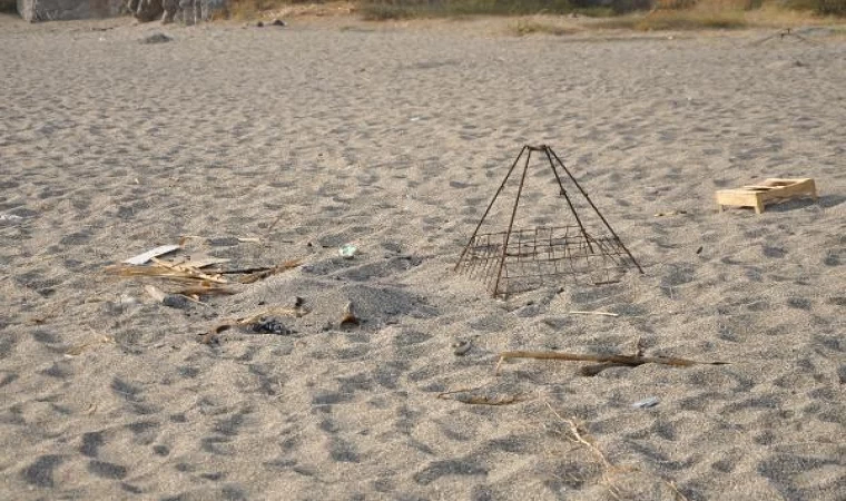 Caretta yuvası üzerinde mangal yakan 2 kişiye para cezası