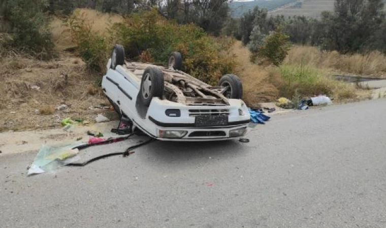 Seyir halinde el freni çekilen otomobil takla atıp, ters döndü