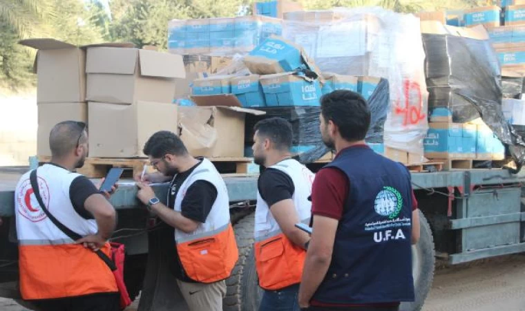 Filistin Kızılayı, insani yardım yüklü 30 kamyonu daha teslim aldı 