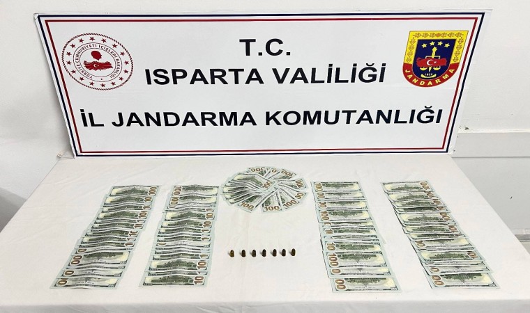 Ispartada piyasaya sahte dolar sürmek üzere olan 3 şahıs yakalandı