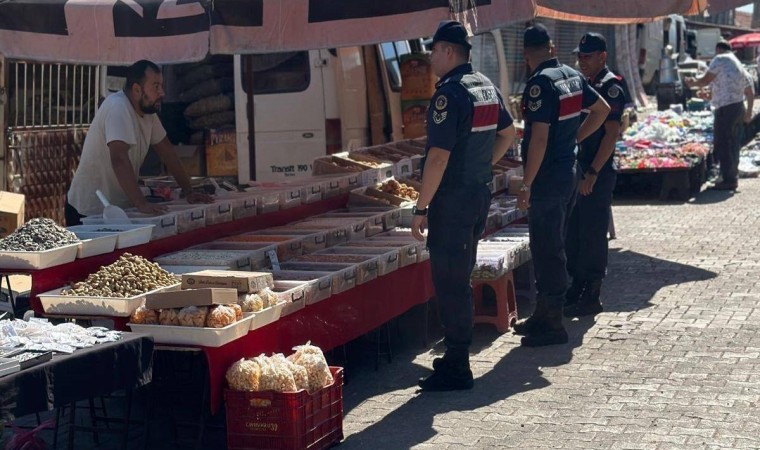 Karacasu jandarması vatandaşları sahte para ve dolandırıcılığa karşı bilgilendirdi