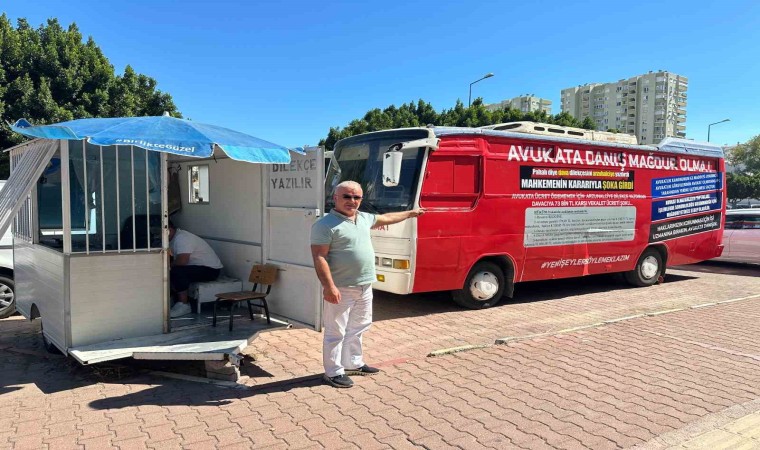 Adliye önünde üzerinde ‘Avukata danış, mağdur olma yazılı meçhul otobüs, arzuhalcileri kızdırdı