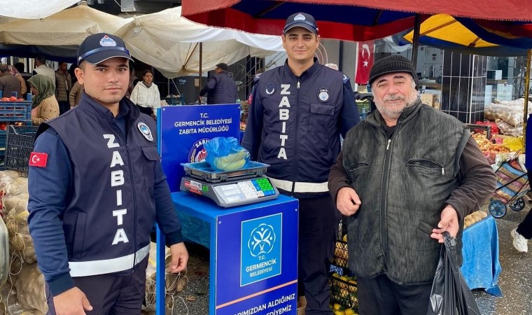 Germencikte pazar yerlerinde başlatılan tartı uygulaması sürüyor