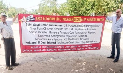 Köy muhtarından arsa alanlara pankartlı uyarı