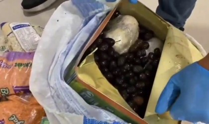 Kahramanmaraşta zeytin tenekesine gizlenmiş 4 kilo uyuşturucu ele geçirildi