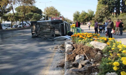 Kontrolden çıkan otomobil yan yatti